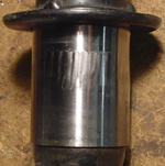 False brinelling shown on a Porsche control arm